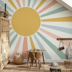 a child's room with sunburst painted on the wall and wooden toys