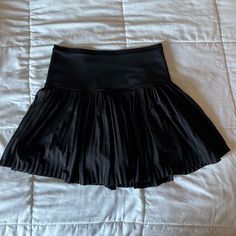 Brand New Condition Black Tennis Skirt With Built-in Shorts, Sports Stretch Pleated Skirt, Stretch Pleated Sports Skirt, Stretch Pleated Skirt For Sports, Spring Tennis Skirt With Wide Waistband For Sports, Black Sporty Bottoms For Cheerleading, Sporty Black Bottoms For Cheerleading, Black Pleated Tennis Skirt For Summer, Sporty Pleated Tennis Skirt For Workout