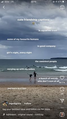 two people are walking on the beach in front of the ocean with words above them