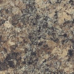 a close up view of a granite countertop with brown and black speckles