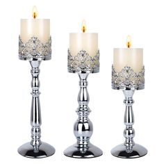 PRICES MAY VARY. ANTIQUE DESIGN: The top of candle holder comes with a skeleton style crown candle holders. The candle holder sets are perfect table centerpieces and would adding a elegant atmosphere to your home whether it is gothic, modern, rustic farmhouse or industrial. Smooth Touch: The large candle holders are made of high quality iron and has a smooth silver finish, which can be kept for years. The set of 3 candle holders all have padded bottom to prevent table scratches. Perfect decorati Candle Stands Decor, Crown Candle Holder, Candle Table Centerpieces, Silver Candle Holders, Tall Candle Holders, Small Candle Holders, Teacup Candles, Tall Candle, Large Candle Holders