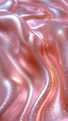 an abstract pink background with gold flecks