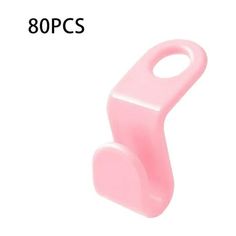 a pink plastic object with the word 80 pcs on it's bottom and bottom