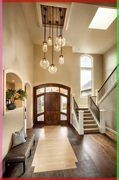 A photo gallery of amazing design ideas for half-turn staircases. Includes new designs every week and other customizable features. Front Entry Way Light Fixture, Entry Way Light Fixtures For High Ceiling, Modern Entryway Chandelier Foyers, Entrance Chandelier Entryway Farmhouse, Front Porch Pendant Light Ceiling, Light Fixtures For Entry Way, Entryway Chandelier Foyers Modern Farmhouse, Entry Foyer Lighting, Vaulted Entryway Lighting