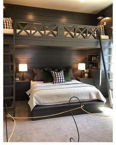 a bed that is in a room with some kind of ladder on the wall above it