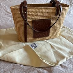 Iconic Loewe Small Square Basket Bag In Raffia And Calfskin. Width:10.4 In Height:8.1 In Depth:3.9 In Loewe Bags, Square Basket, Square Baskets, Vintage Revival, Loewe Bag, 2024 Color, June 2024, Basket Bag, Straw Bag