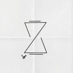 a piece of paper with a triangle drawn on it