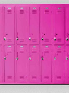 a row of pink lockers against a white wall