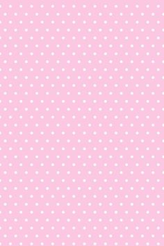 a pink background with white polka dots