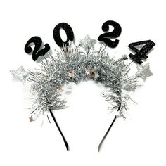 Features: Brand new and high quality Stands out from the crowd with our 2024 tinsel headband with cute star decorations, the perfect accessory to wear at any event Crafted from tinsel and felt cloth, this headband is both fashion and durable, ensuring a comfortable fit for head sizes between 55-60cm/21.65-23.62in Great for fashion-forward individuals looking to add sparkles to their outfit, as well as festival-goers and party enthusiasts Whether you're attending a music festival, a costume party New Years Headbands, New Year Headband, New Year Hairstyle, Felt Headband, Kids Christmas Party, Kids Headbands, Cute Stars, Star Decorations, Glitter Stars