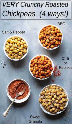 four bowls filled with different kinds of chickpeas next to each other on a table