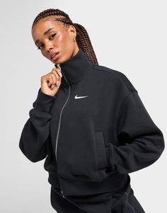 Upgrade your layers with this women's Pheonix Full Zip Track Top from Nike. In a Black colourway, this oversized top is cut from smooth Phoenix fleece for total comfort. It features a full-zip fastening and high-collar for adjustable coverage, with ribbed trims to hold the shape and dropped shoulders for extra room. With side pockets for storage, it's finished up with a Swoosh to the chest. Machine washable | Our model is 5'7" and wears a size small. Chest Machine, Oversized Top, Black Nike, Extra Room, Jd Sports, High Collar, Black Nikes, Phoenix, Track