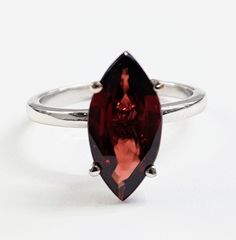 A gentle  14K White gold ring set with 2.02 ct real red  garnet marquise gem Solitaire 4 prongs ring wedding ring delicate & impressing ✦ Perfect Setting ✦ EG Labs certification! gift box ✶✶ SHINE BRIGHT WITH A DIAMOND ✶✶ We create luxury handmade jewelry just for you, using the best quality diamonds, gemstones and gold. With more than 30 years of experience, we design high fashion jewelry for your everyday moments as well as special occasions. We bring you the hottest trends in jewelry styles - Marquise Ruby Ring, Etsy Engagement Rings, Red Garnet Ring, High Fashion Jewelry, Marquise Ring, Ring Marquise, Jewelry Styles, Engagement Rings Marquise, Gold Ring Sets