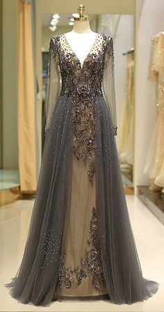 # DT0484 * DESCRIPTION Tulle long dress with beading,long sleeves * ATTRIBUTES Long A-line Dress With Sleeves Prom, Unique Prom Dresses Long, Prom Dress With Sleeves, Gaun Koktail, Baju Kahwin, Sweep Train Prom Dress, Grey Prom Dress, Dress Graduation, A Line Evening Dress