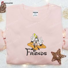 Introducing our Best Friend Goofy Embroidered Sweatshirt, a must-have for any Disney enthusiast! Made with premium quality fabric, this sweatshirt features a vibrant embroidery of Goofy, bringing your favorite character to life. With its cozy and comfortable fit, it’s perfect for lounging at home or going out with friends. The sweatshirt also makes for an ideal gift, showcasing your love for Disney and friendship. Its unique design and attention to detail make it a standout piece in any wa Disney Characters Goofy, Goofy Disney, Embroidered Shirts, Shamrock Shirt, Best Gift Ideas, Daisy Duck, Disney Lover, Disney Character, Embroidered Clothes