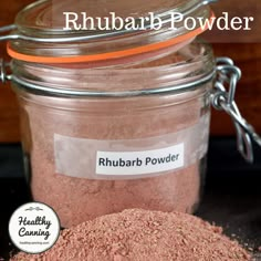 a close up of a jar of rhubarb powder with the label rhubarb powder