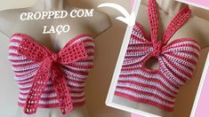 a crocheted pink and white top with a bow