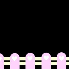 a row of pink hearts sitting on top of a yellow line next to a black background