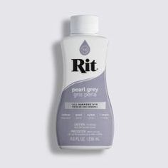 a bottle of rit toothpaste on a white background