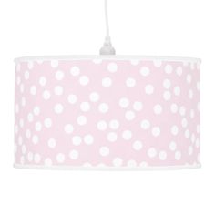 a pink and white polka dot lamp shade