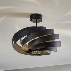 a circular light fixture hanging from the ceiling