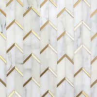 a white marble wall with gold lines on it