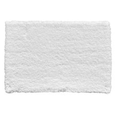 a white bath rug on top of a white floor with an empty area for text