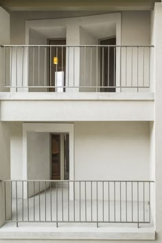 an apartment building with balconies and balcony