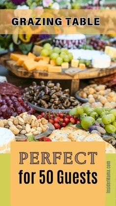 a table filled with lots of different types of cheeses and nuts on it's sides