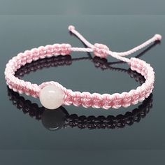 Hand-Made Pink String Bracelet With A 10mm Rose Quarts For Wrist Sizes 6 Inches To 9 Inches. The Rose Quarts Semi Precious Stone Bead Measures 10mm. These Bracelets Are Worn To Attract Good Fortune, Bring A Good Mood And To Ward Off Bad Vibes. Each Bracelet Is Carefully Handcrafted And Given Proper Time To Ensure Quality. Fast Shipping Pink String Bracelet, Jade Bracelet, Crochet Flower Tutorial, String Bracelet, Pink Bracelet, Braided Bracelets, Womens Jewelry Bracelets, Stone Color, Semiprecious Stones