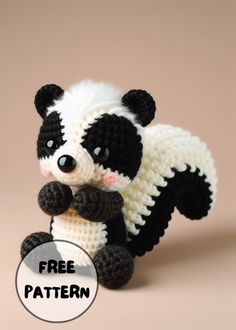 a crocheted panda bear is posed with its paws on his chest and the words free pattern below it