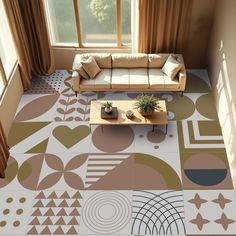 an aerial view of a living room with a couch and coffee table on the floor