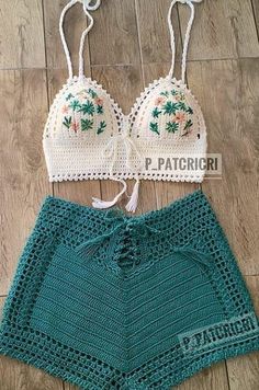 two pieces of crochet swimsuit on the floor