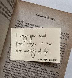 a piece of paper that has been placed on top of an open book with the words i pray you heal from things no one ever applied for