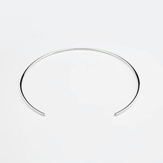 Handmade solid sterling silver choker necklace. Round, open design, polished finish. Perfect for stacking or as a minimalist statement.Diameter: 115 mmOpening width: 55 mmWire width: 2 mmVisit my shop: http://www.etsy.com/shop/jewelryMirta© MIRTA Modern Sterling Silver Choker Necklace, Modern Polished Choker Jewelry, Modern White Gold Choker Necklace, Simple Silver Choker Jewelry, Sterling Silver Choker In Silver, Modern Silver Choker Jewelry, Silver Sterling Silver Choker, Minimalist Polished Sterling Silver Bracelet, Modern Sterling Silver Choker For Gift