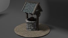 a model of a water well with a roof