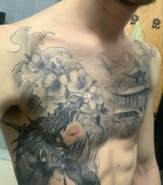 a man with a tattoo on his chest