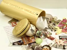 a table topped with lots of assorted items on top of it's surface