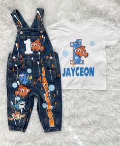 "Custom Finding Nemo birthday overalls with shirt. ANY CHARACTER or THEME can be done. Production time is now 3 WEEKS so please order in a timely manner.  If you need it before 3 WEEKS, a \"Rush Order Fee\" is REQUIRED & does NOT include shipping. This option is listed on my shop & has to be added to your cart.  Outfits aren't guaranteed to stay intact if washed or dried, so please be mindful of this. This is typically a one time wear outfit. *Please note that no outfit will look identical as th Finding Nemo First Birthday Boy, Finding Nemo Birthday Party Ideas, Finding Nemo First Birthday, First Birthday Nemo Theme, Finding Nemo Birthday Shirt Ideas, Finding Nemo One Year Old Birthday, Cookie Monster 1st Birthday Outfit, How To Patch Jeans, Nemo Birthday Party