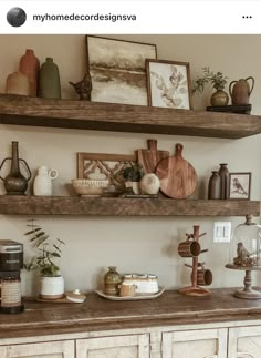 two wooden shelves with pictures and other items on them