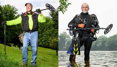 two men in wetsuits holding water skis and standing next to each other