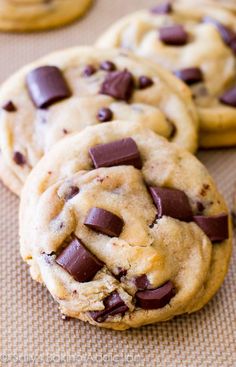 chocolate chip cookies on a baking sheet ready to be eaten