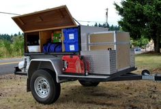 the back end of a truck with an open storage compartment