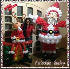 an inflatable santa clause balloon with reindeer and antlers