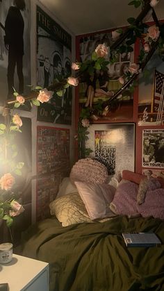 a bedroom with lots of flowers and pictures on the wall