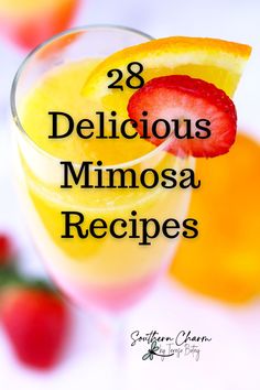 a close up of a drink in a glass with strawberries on the rim and text overlay that reads 28 delicious mimosa recipes