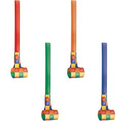 three different colored candles are in the shape of lego blocks and one is orange, green, blue, and yellow