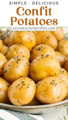 a bowl full of potatoes with text overlay that reads simple delicious confit potatoes