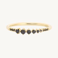 A delicate string of black diamonds on the finger, tapering gently into the gold band. Works very well as a fancy stacking ring, or to mark a special occasion. Fine Jewelry Gold Diamond Ring With Black Diamonds, Elegant 14k Gold Rings With Black Diamonds, Gold Diamond Ring With Black Diamonds For Gift, Black Diamond Rings In 14k Gold, Elegant Black Enamel Diamond Ring, Gold Rings Wedding, Gold Band Wedding Ring, Personalized Charm Necklace, Jennie Kwon