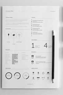 a black and white resume on top of a piece of paper next to a pen